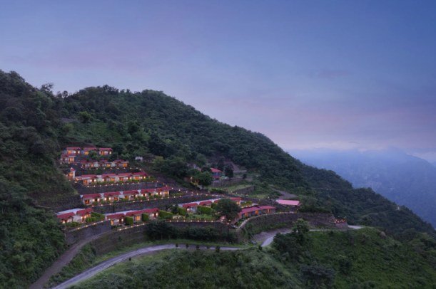 Arka villas on the hillside at dusk, Rishikesh